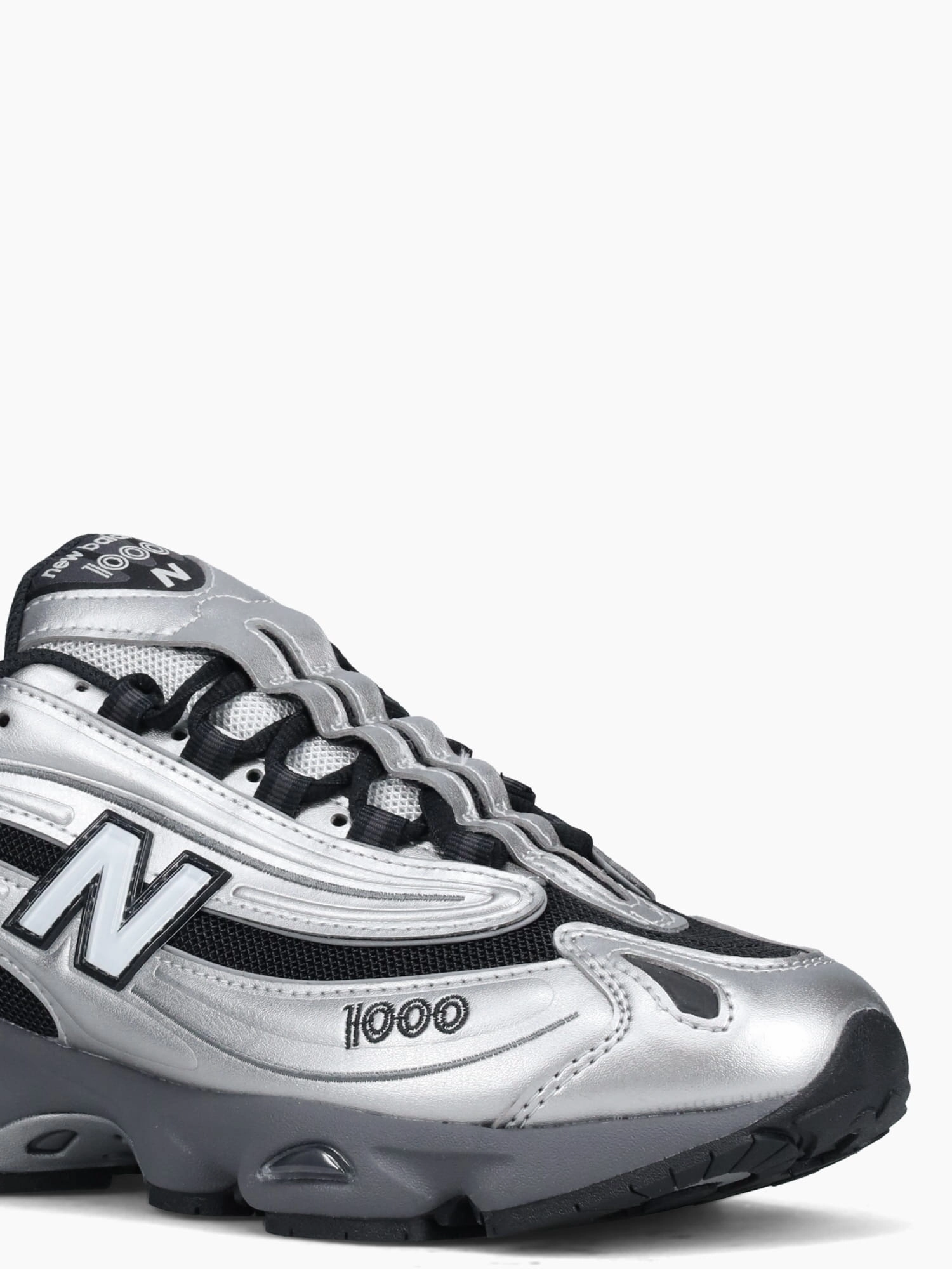 Casual Canvas Shoes Crossword Clue 1000 Silver Leather