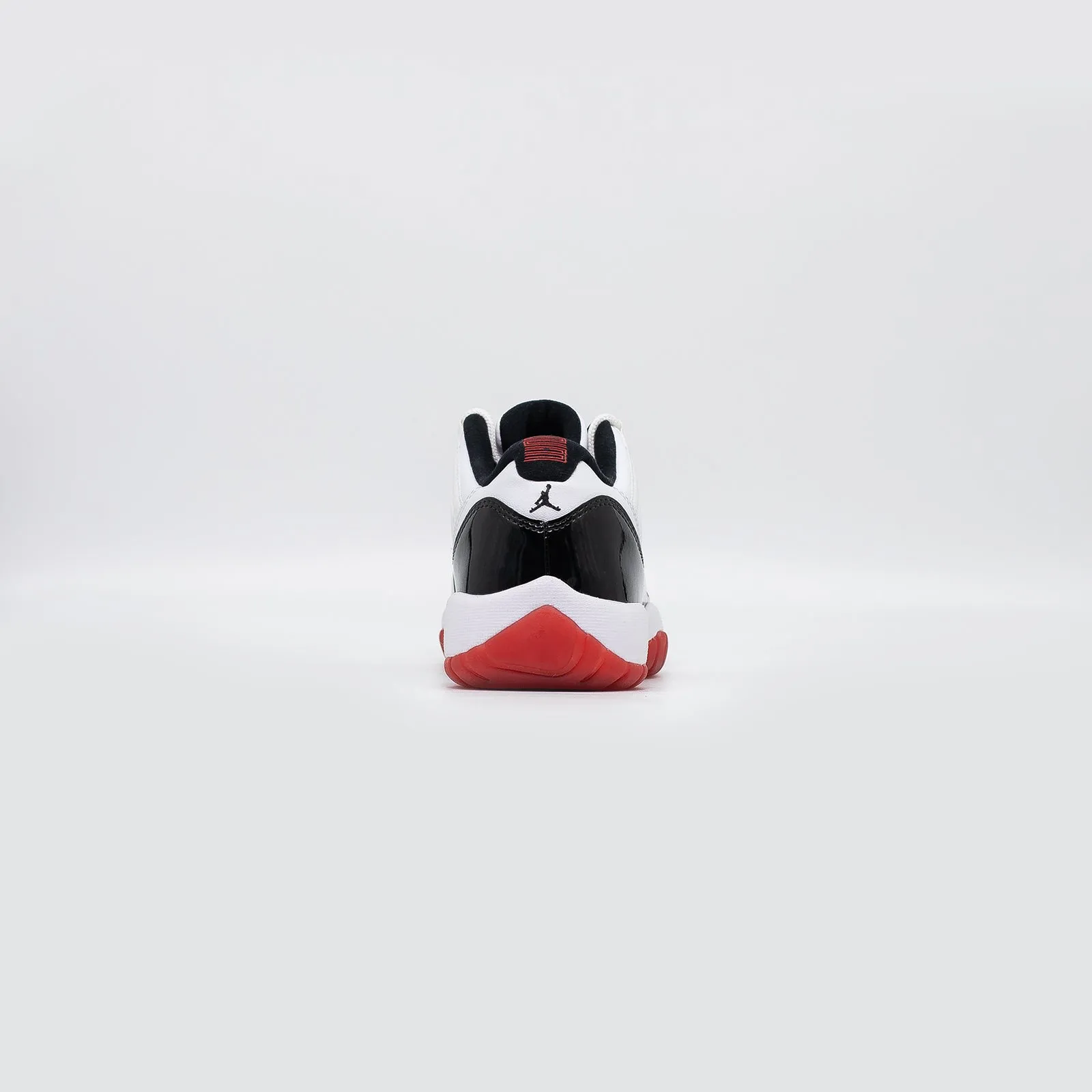 Air Jordan 11 Low (GS), Concord- Bred 2 Inch Platform Sneakers