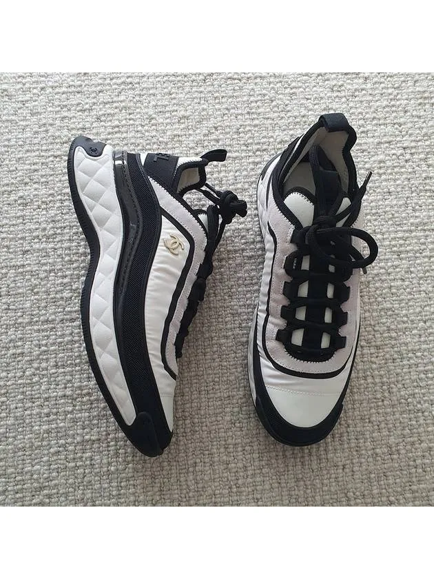 Tabitha Sneakers CC Logo Mixed Fiber Low Top Sneakers Black White Chanel