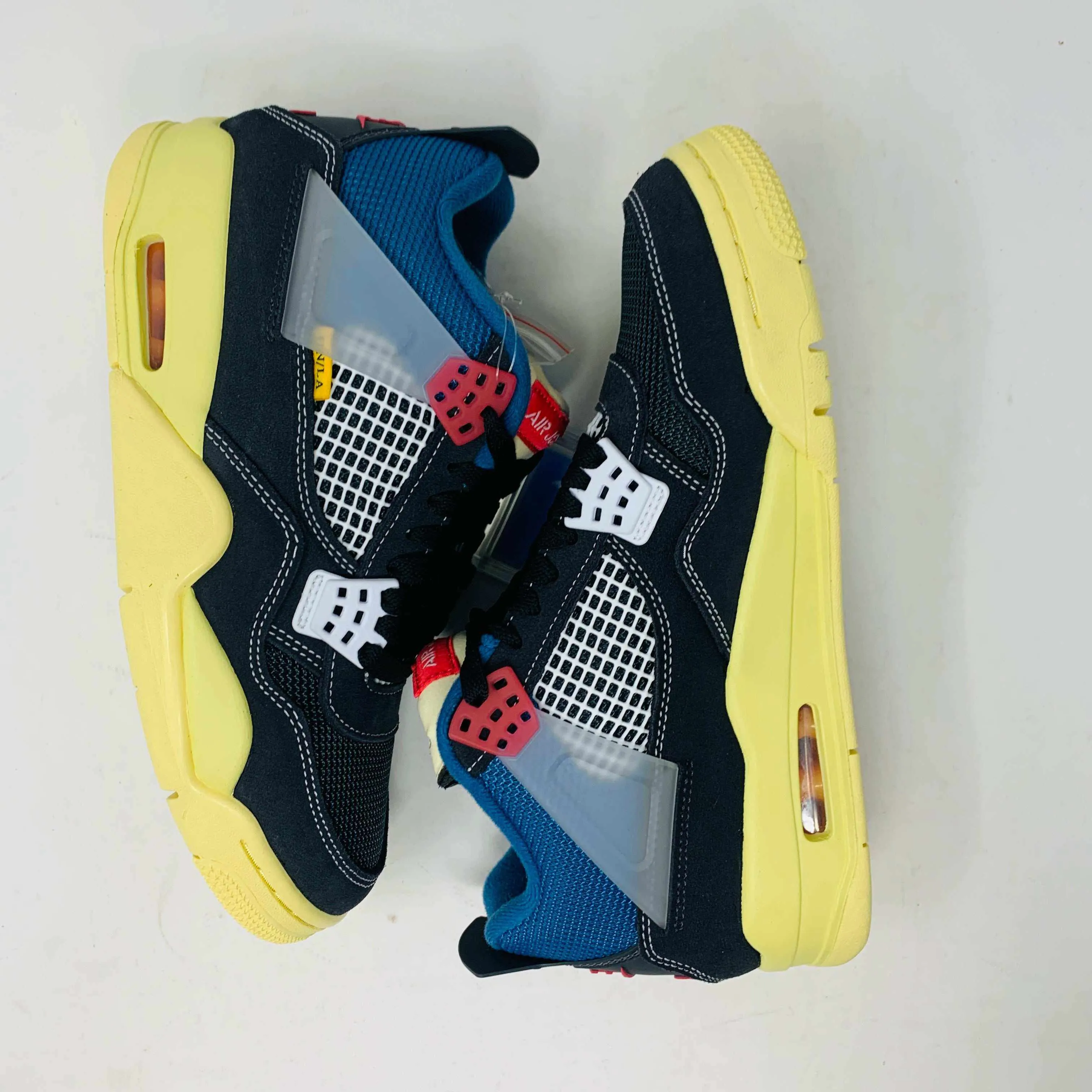 Jordan 4 Union Noir Peter Millar Suede Sneakers