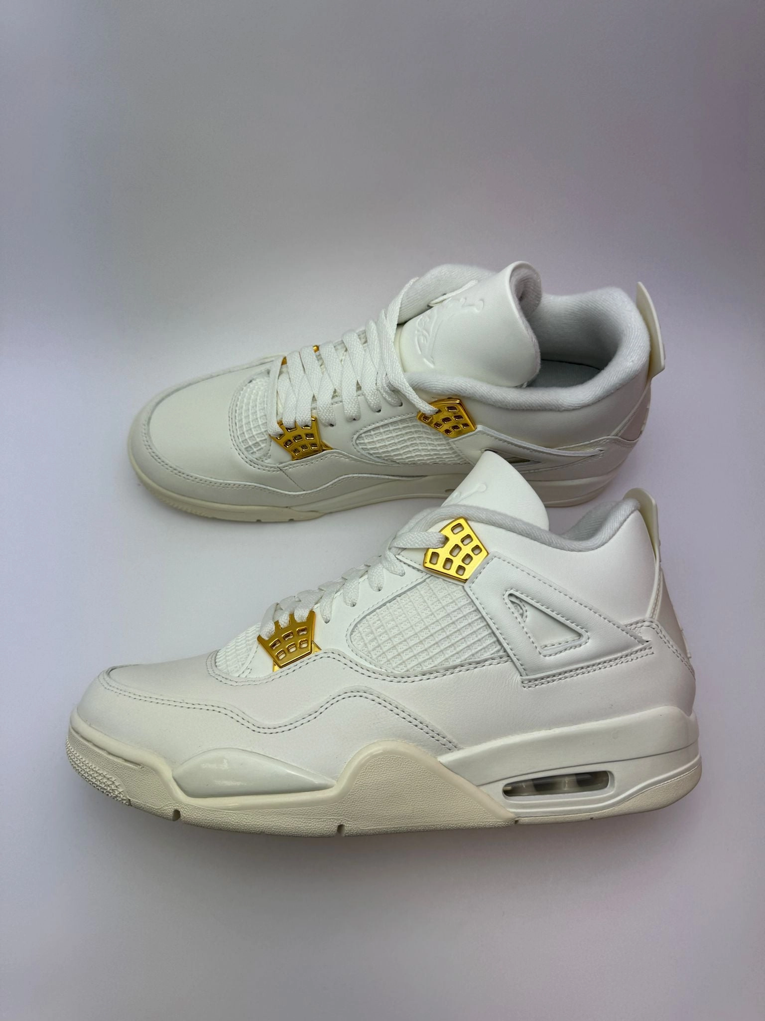 Female Sneakers Jordan 4 Retro "Metallic Gold"