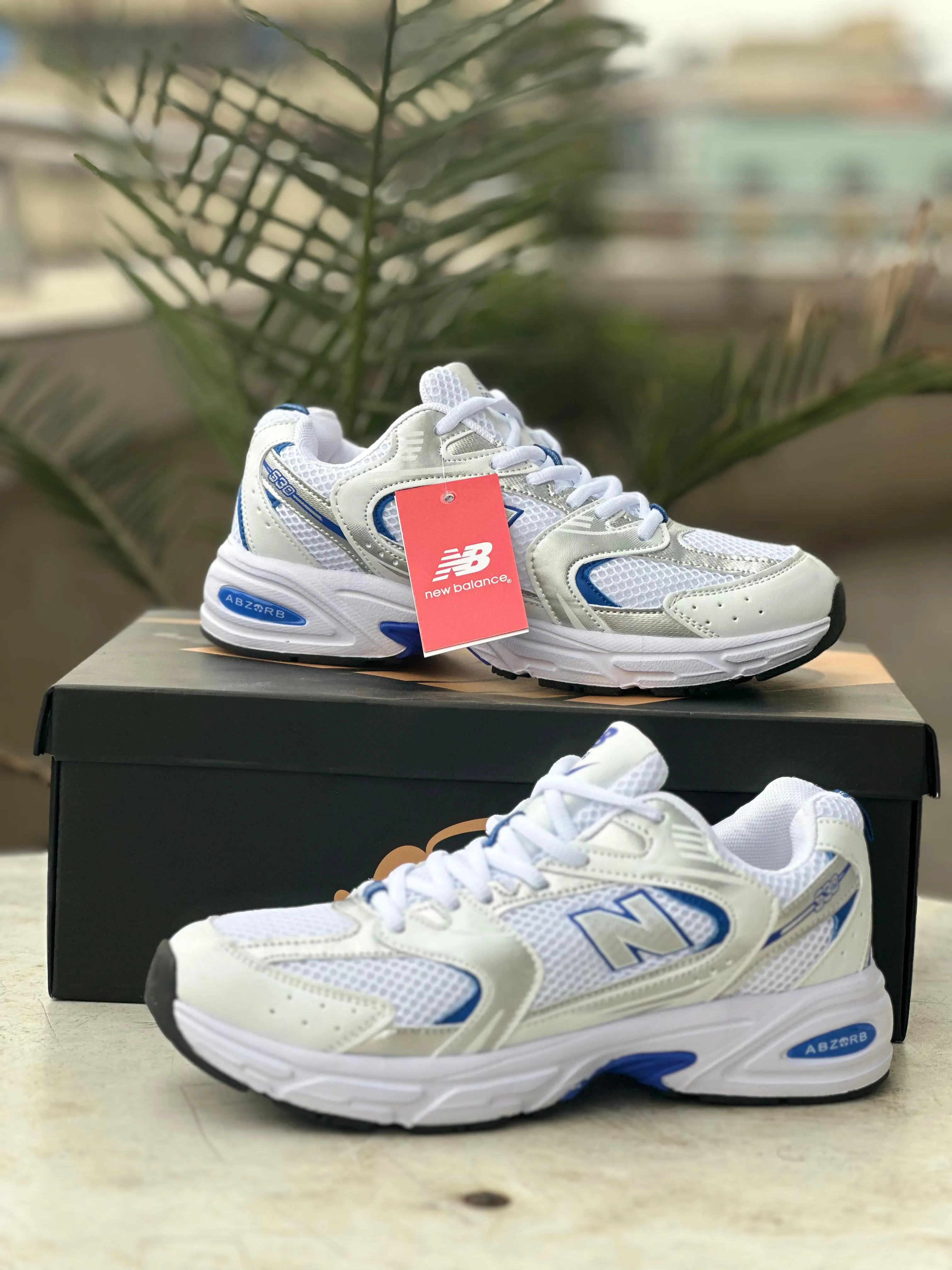 Burgundy New Balance 9060 New Balance 530 White/Silver/Blue Running Sneakers