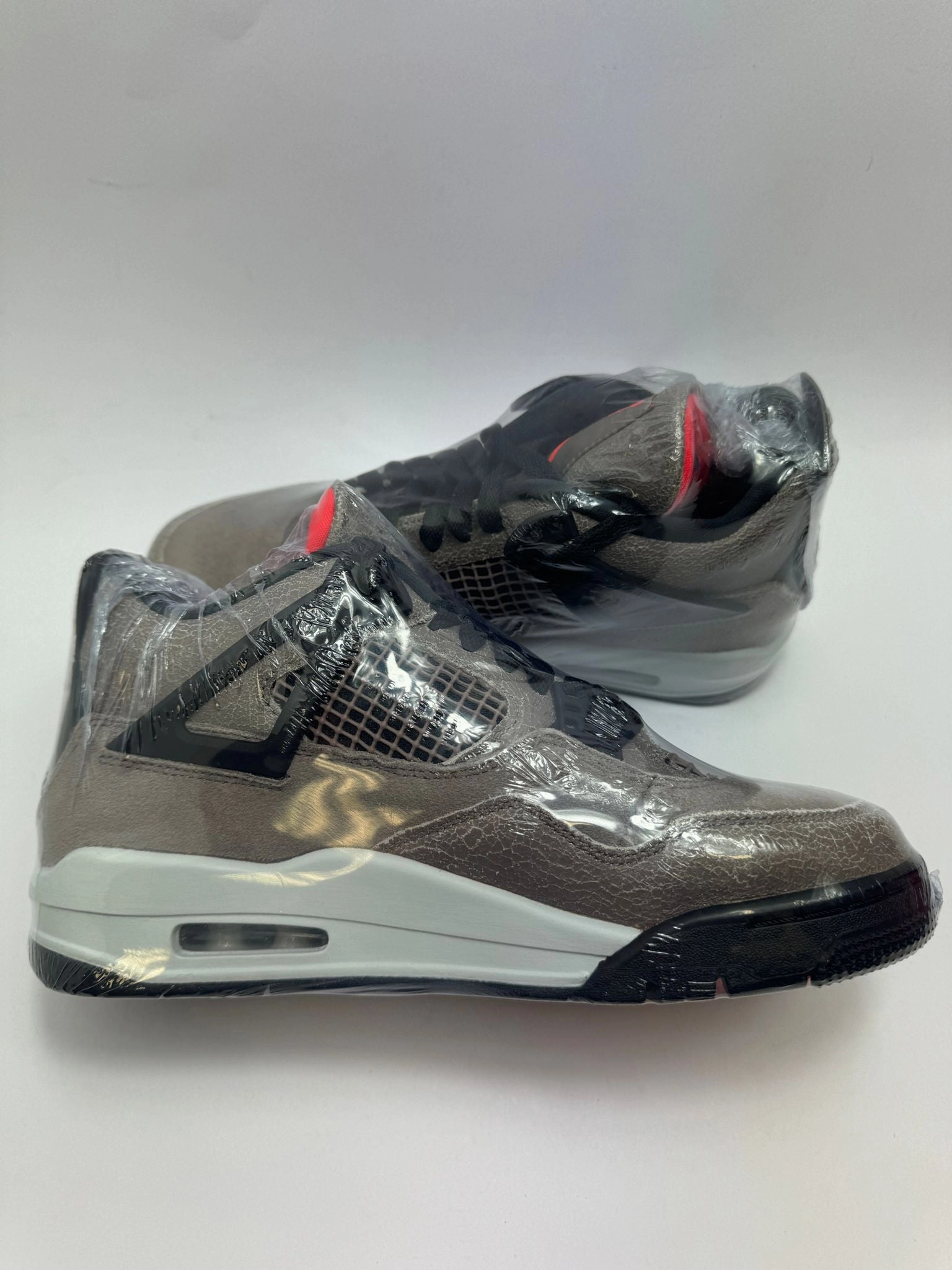 Jordan 4 Retro "Taupe Haze" Complex Magazine Sneakers