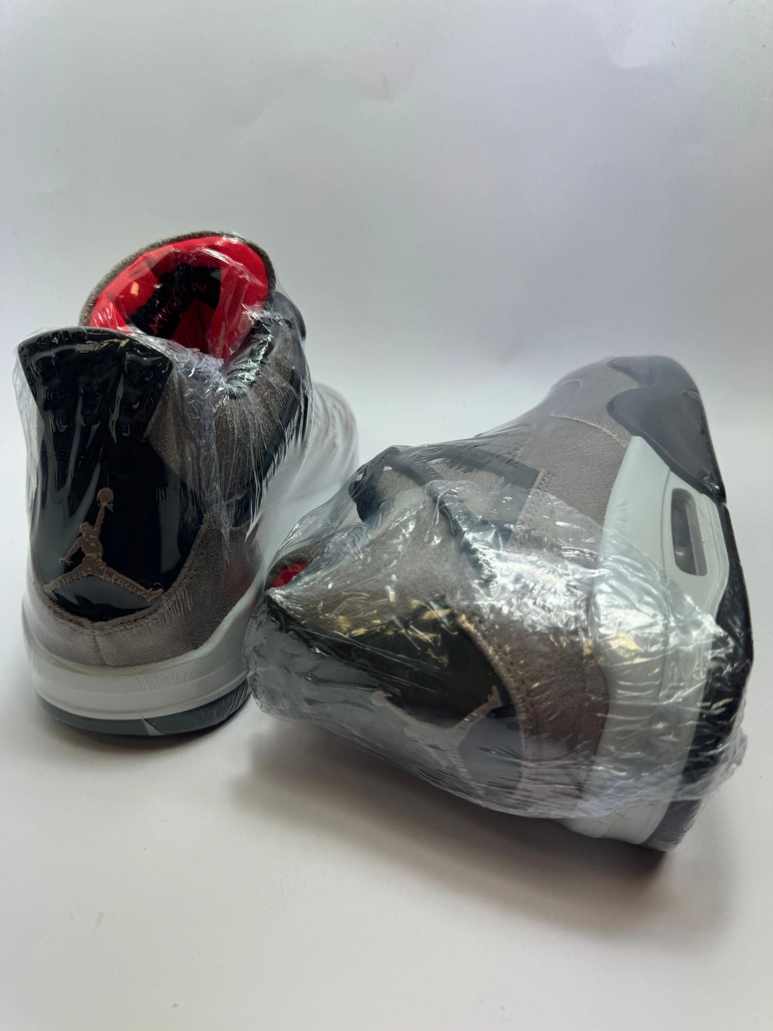 Jordan 4 Retro "Taupe Haze" Cadillac Sneakers