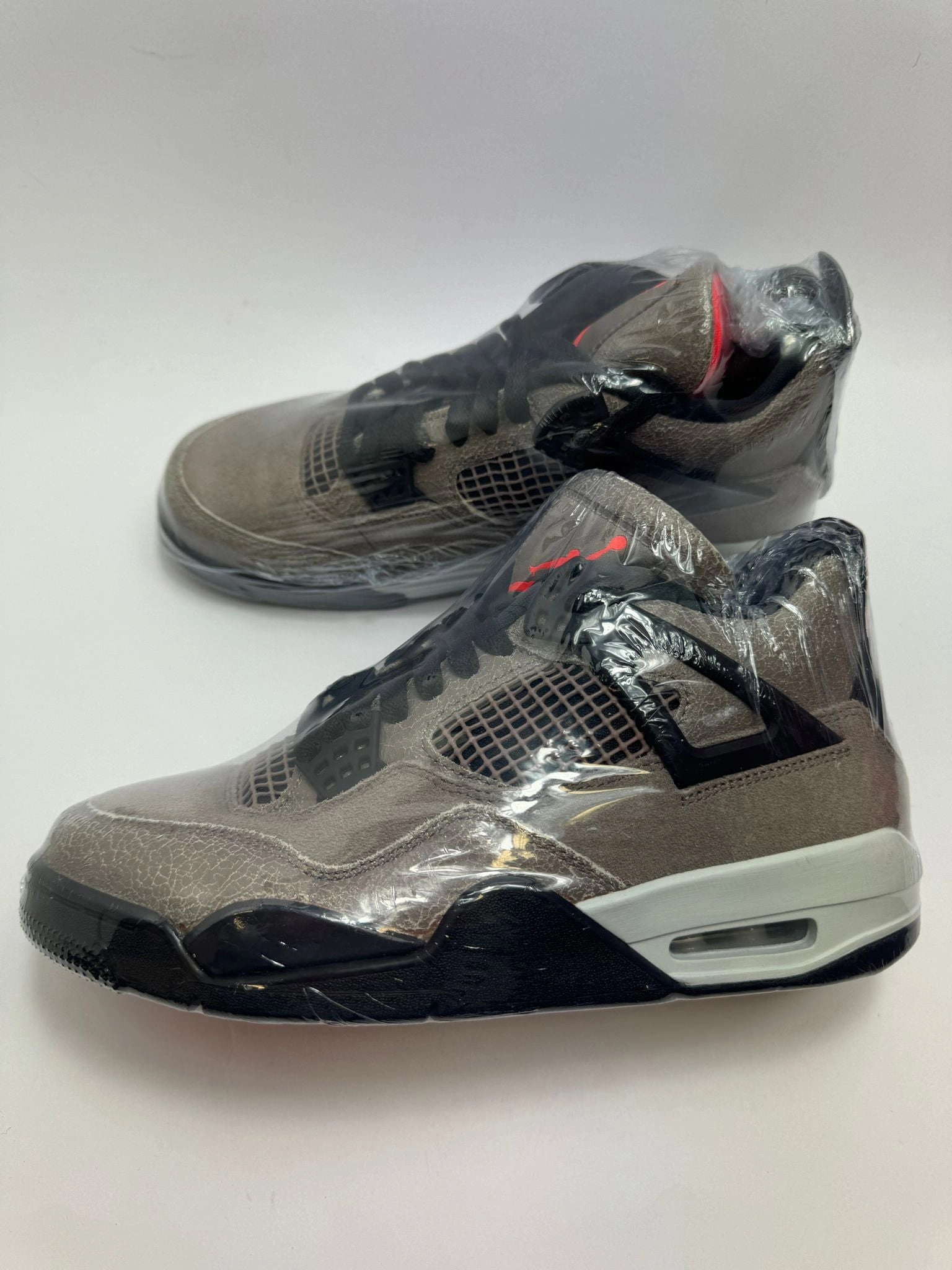 Jordan 4 Retro "Taupe Haze" Rocker Sneakers